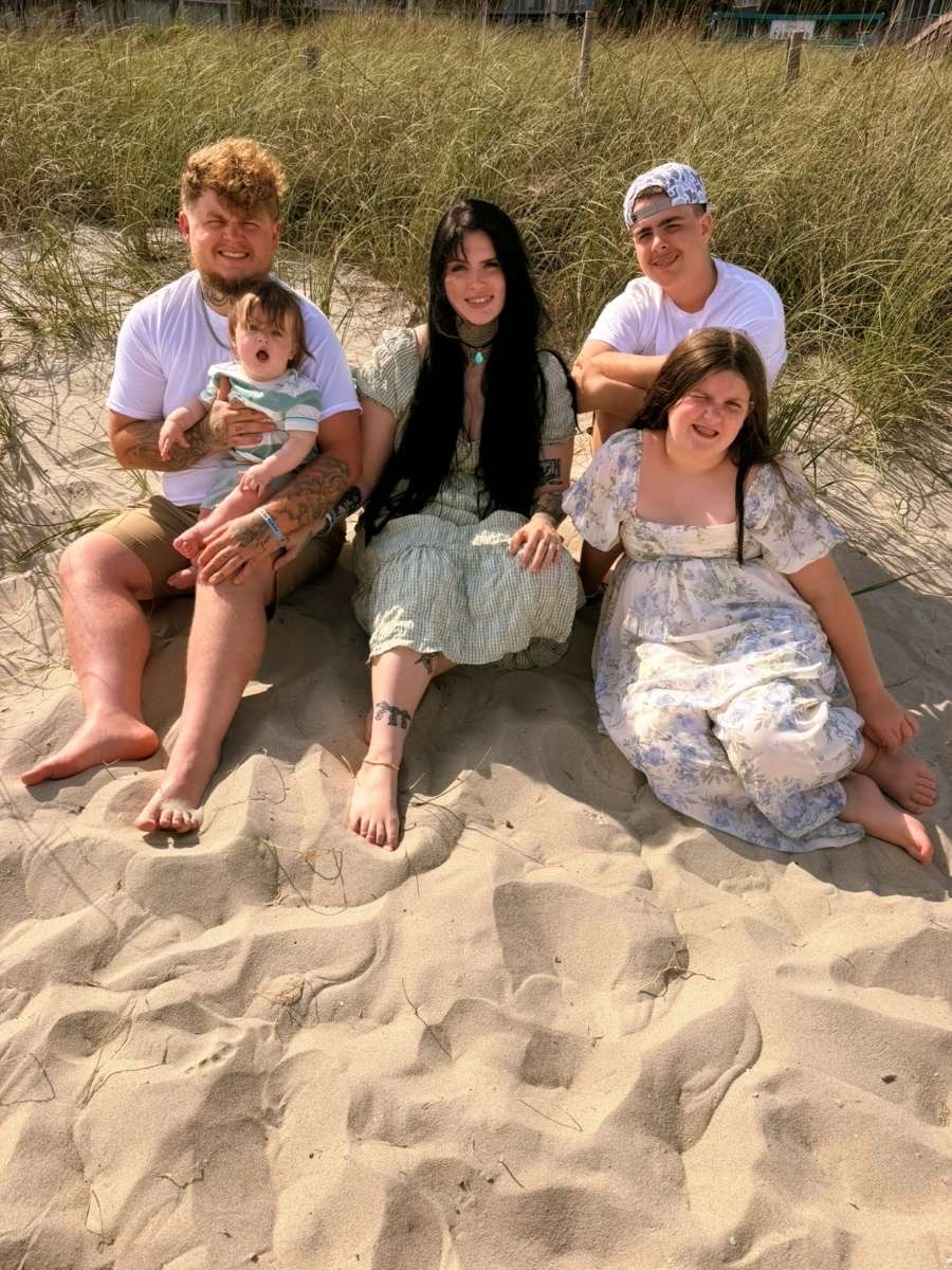 Hayden Eudy with his family at home